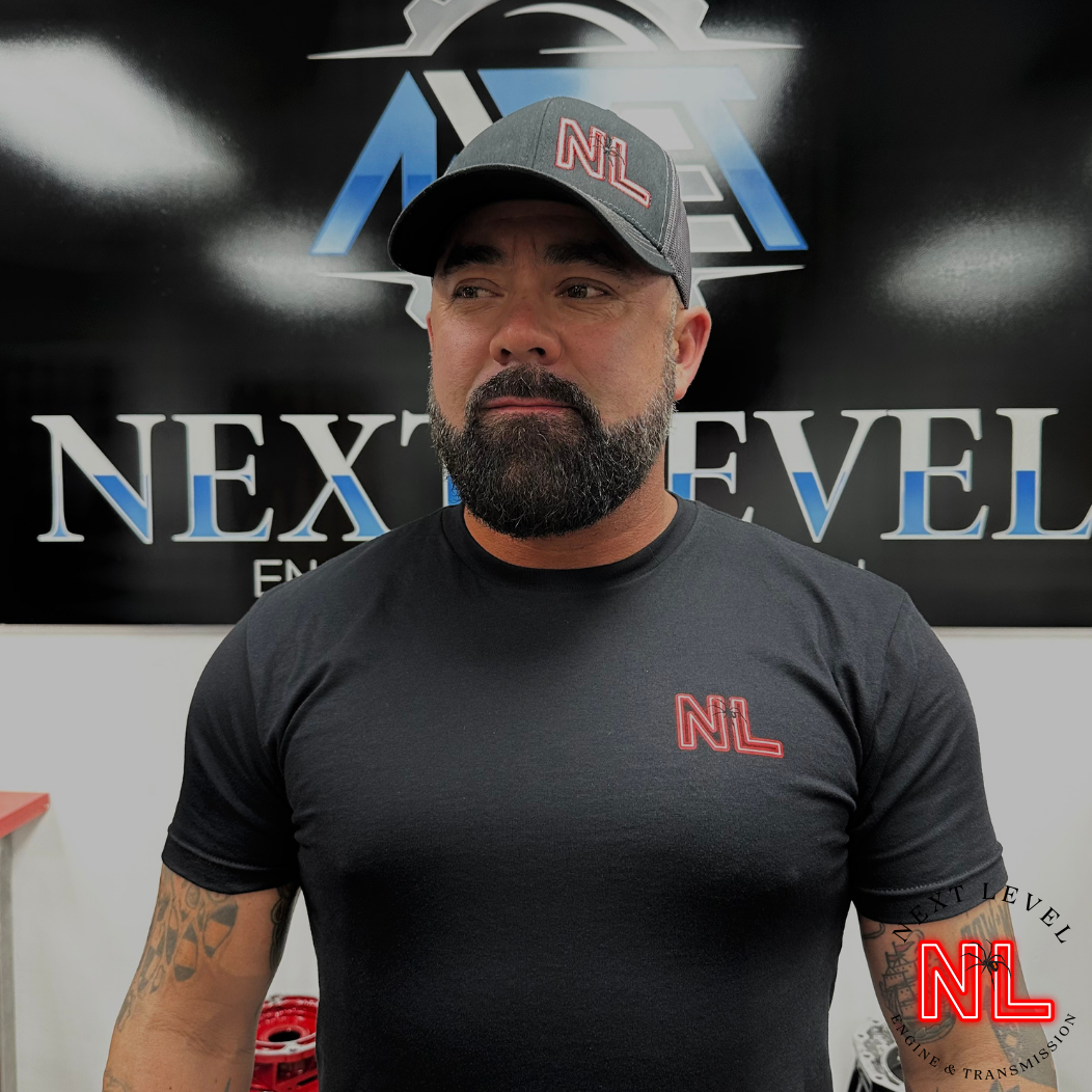 "Next Level" Trucker Snap Back Logo Hat